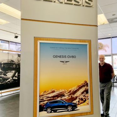 Aotomotive dealership with Genesis large format posters